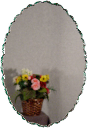 Chipped oval frameless mirror